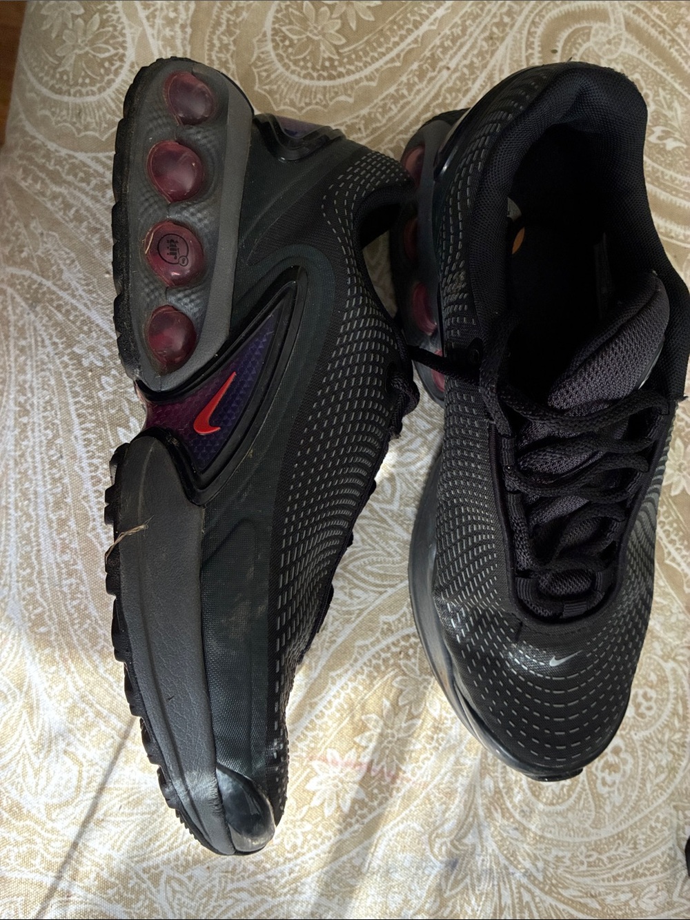 Nike Women’s Black Sneakers with Purple and Red Accents